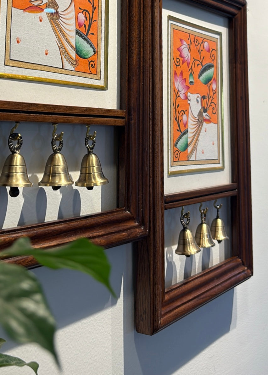 Kamdhenu Krupa | Hand-Painted Pichwai Teak Wood Wall Frame with Brass Bells – Saffron